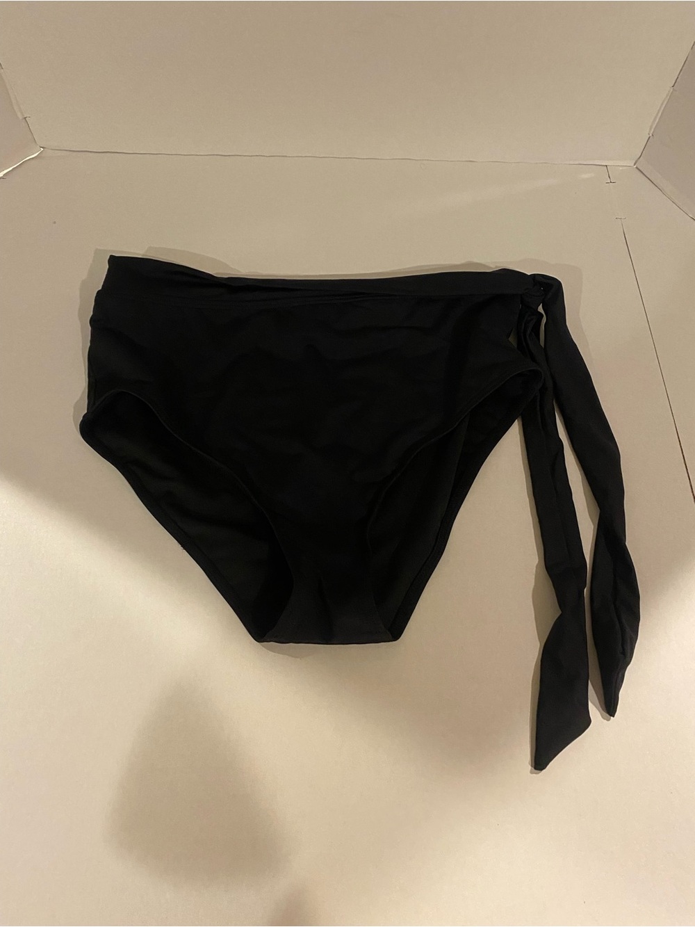 Yonique side tie black bikini bottoms